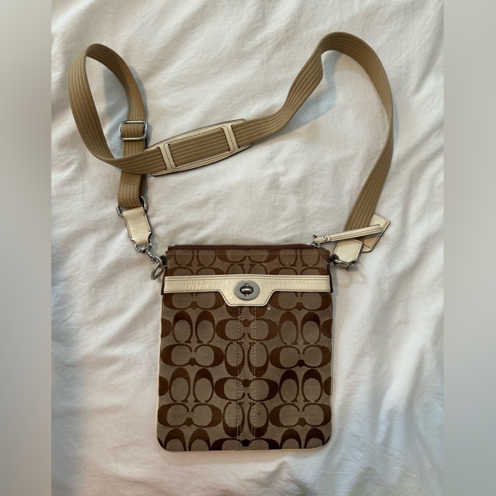 Coach signature canvas crossbody bag with white leather